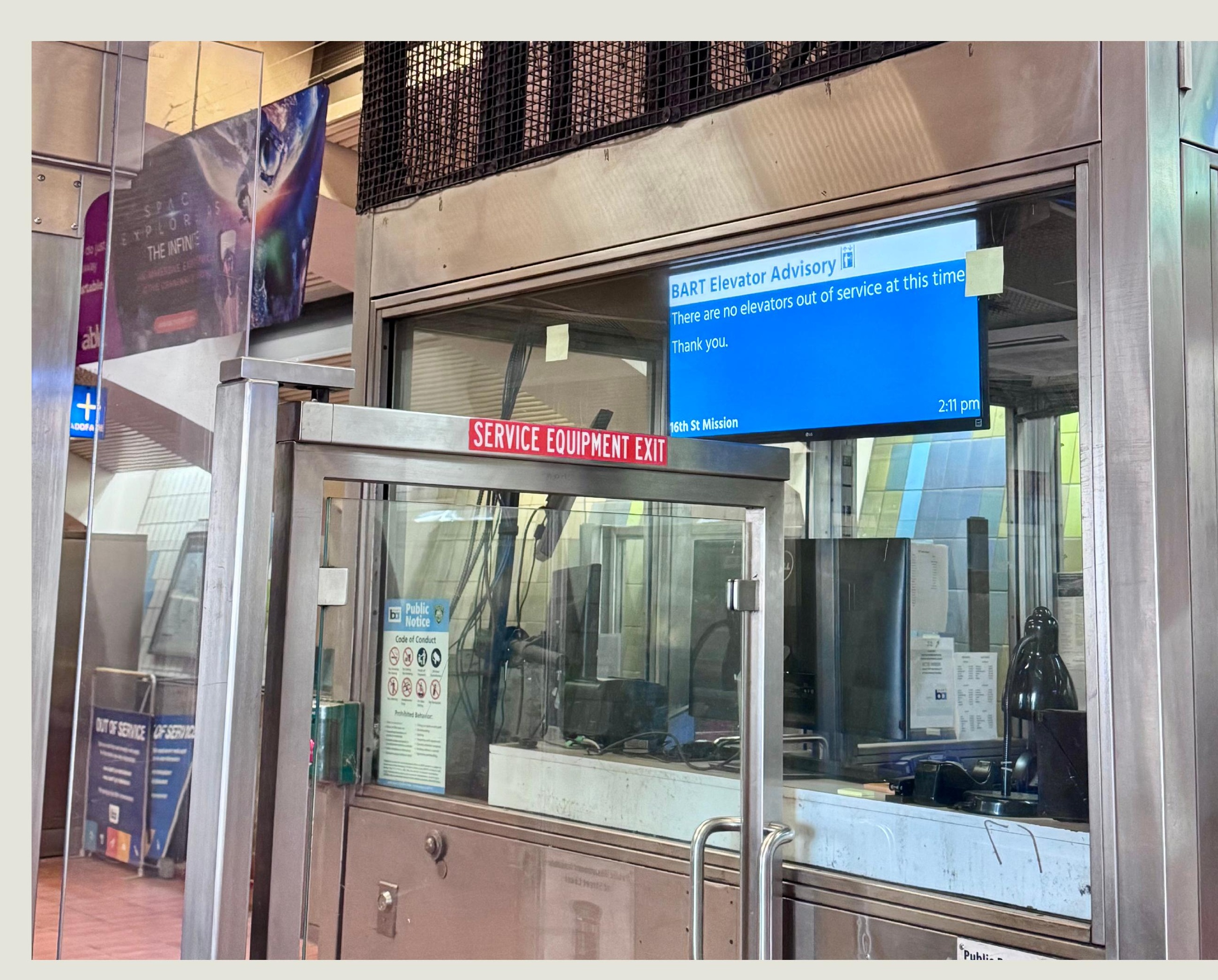 Current BART in-station Elevator Advisory screen — generic message behind station booth glass